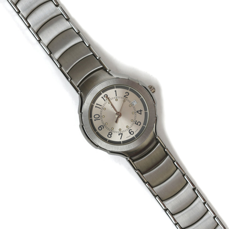 vintage Yves Saint Laurent (YSL) Round Dial Silver plated Quartz Watch - beg borrow steal studio