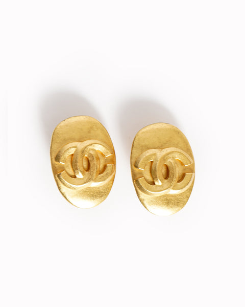 Vintage Chanel oval CC logo earrings - beg borrow steal studio