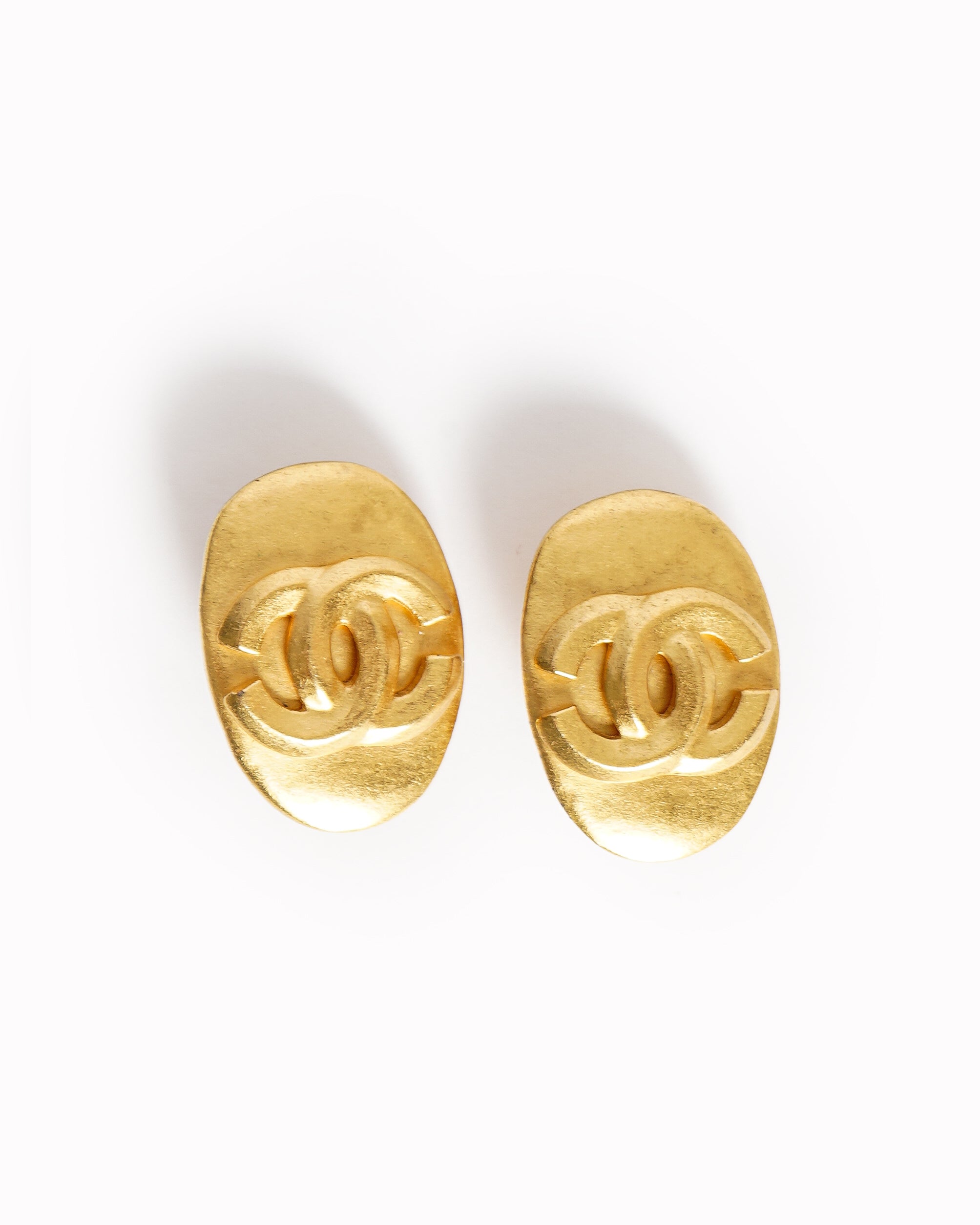 Vintage Chanel oval CC logo earrings - beg borrow steal studio